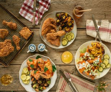 Three Tupelo Honey riffs on fried chicken: Honey Dusted, Sweet & Sour (with sriracha honey) and Bleu Buffalo (with Buffalo hot sauce, bleu cheese crumbles, shaved celery).